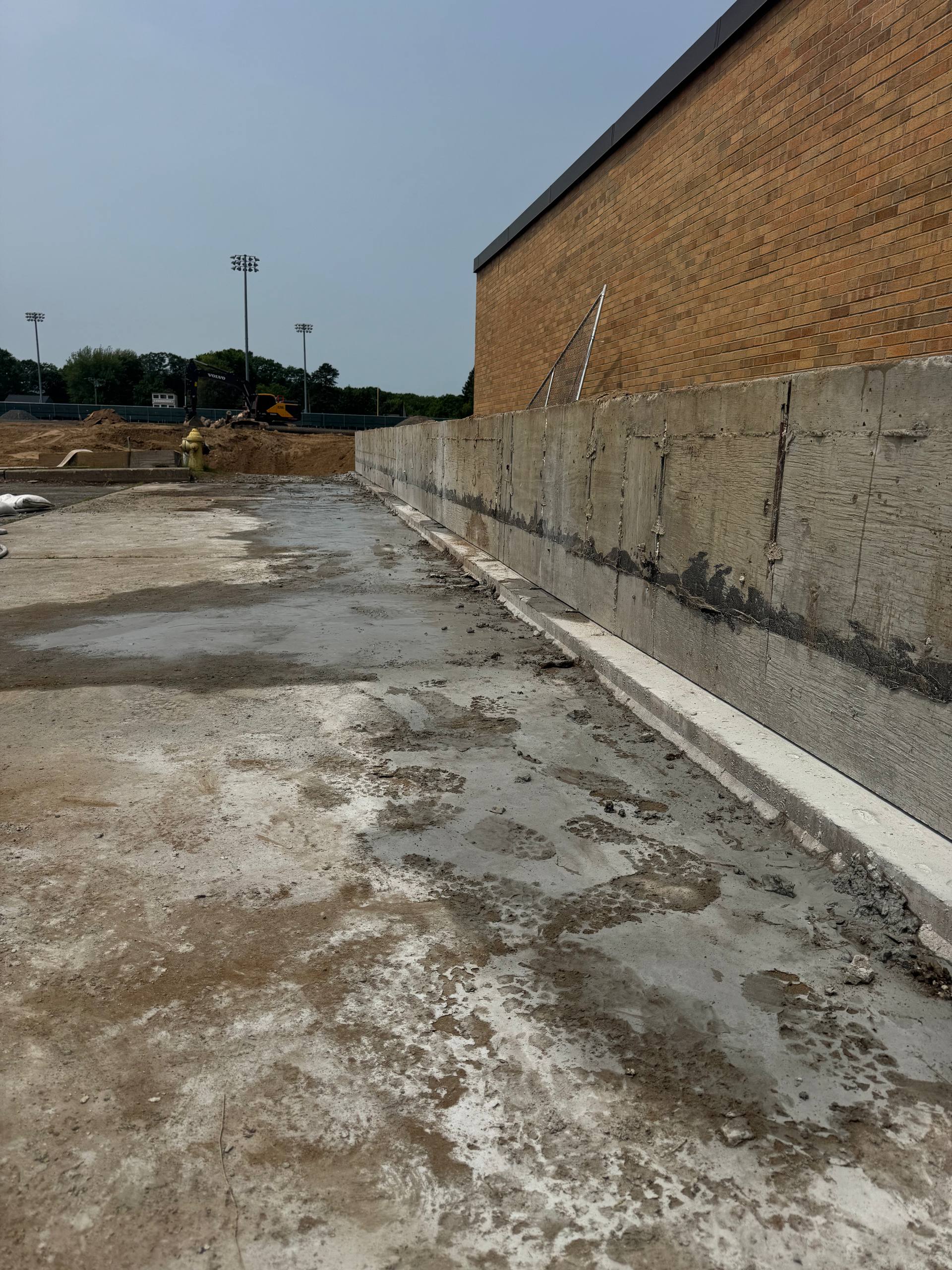 Foundation wall cutting completed at commercial construction site in MA